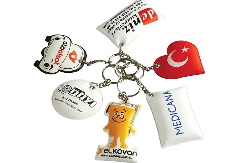 İki Renk Baskılı Puf Anahtarlık için logolu promosyon üretimi