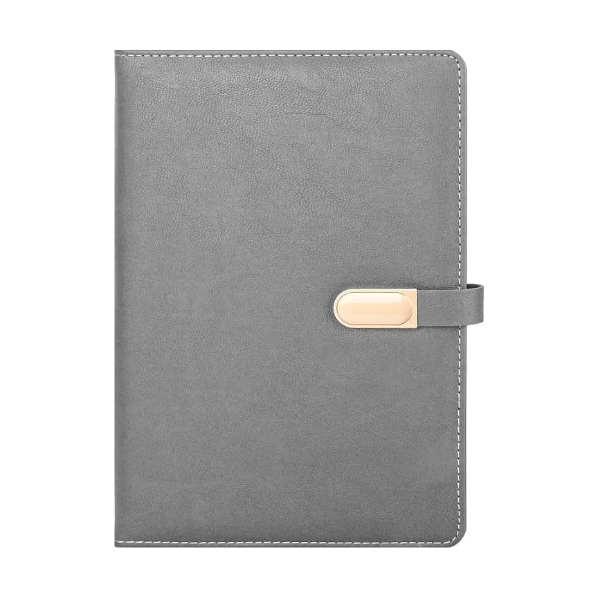 Gri kapaklı, çevresi dikişli, sağ yanında metal tokalı kapak bandı bulunan sert kapaklı defter.