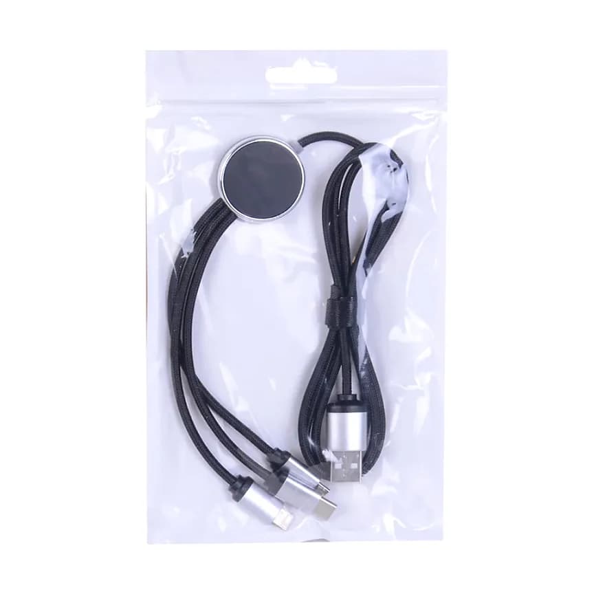 Şeffaf poşette siyah çok uçlu USB kablosu; üç metal konektör ve yuvarlak manyetik şarj başlığı.